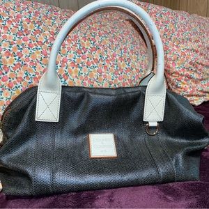 Woman’s Dooney & Bourke purse